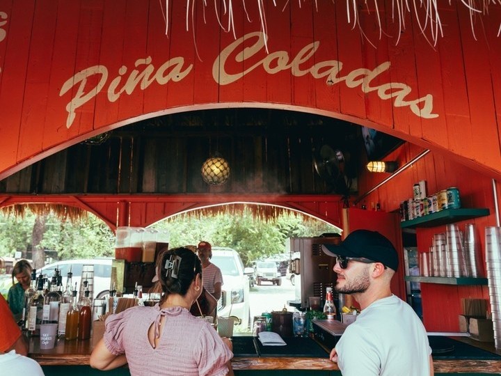 a man and a woman sitting at a table in a restaurant