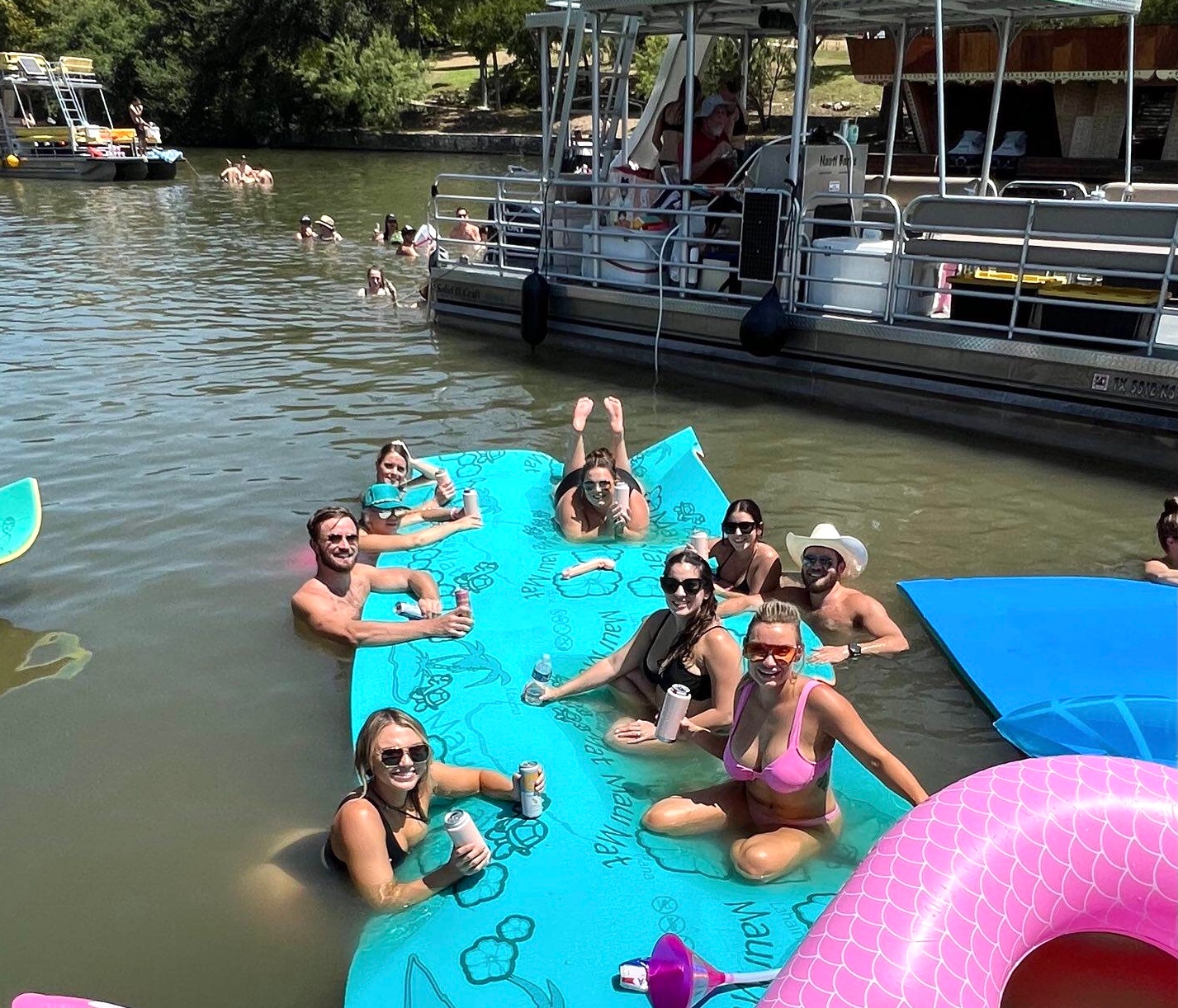 a group of people swimming in a body of water