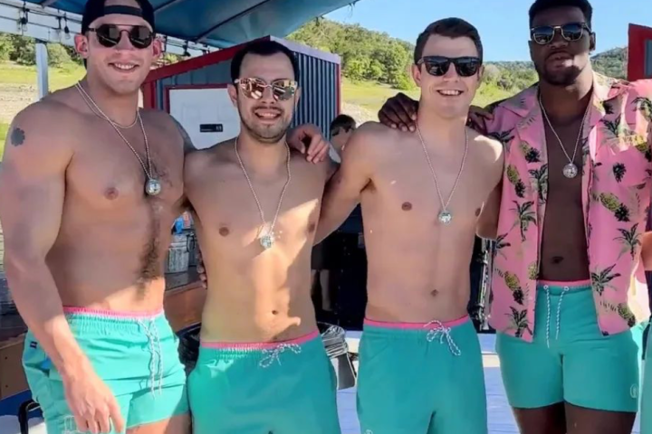 a group of people posing for a photo