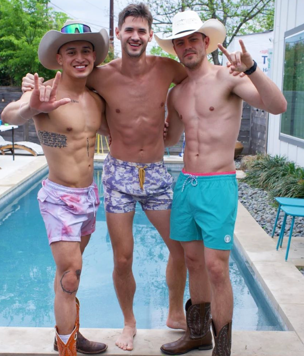 a group of people posing for the camera