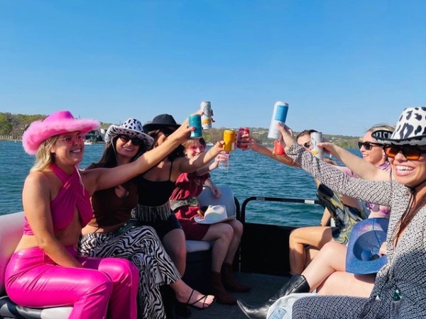 a group of people sitting on a stage